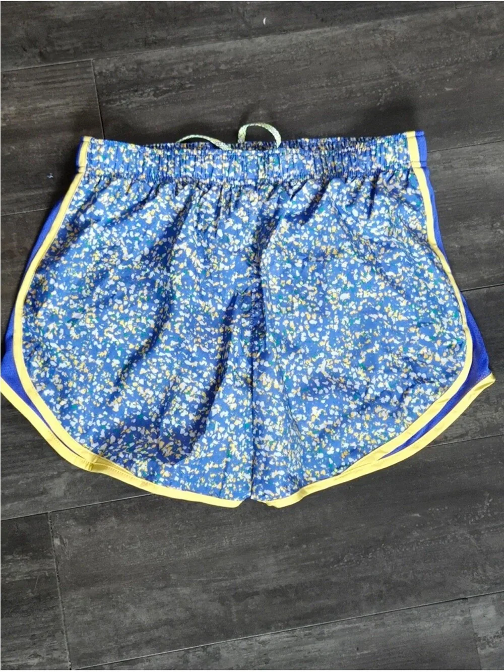 Nike Blue Floral Print Athletic Shorts with Yellow Trim